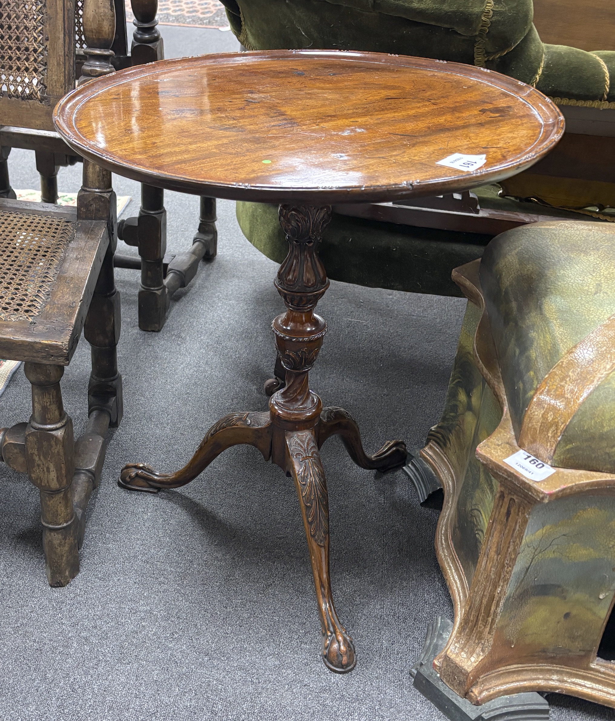 A George III style mahogany circular tripod tea table, diameter 54cm, height 63cm